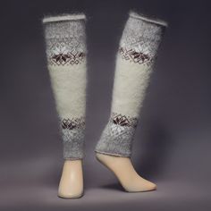 Grey and white goat hair leg warmers with white and dark-brown snowflakes - front view. Casual Winter Yoga Leg Warmers, Casual Winter Leg Warmers For Yoga, Casual Leg Warmers For Yoga In Winter, Fitted Leg Warmers For Winter Outdoor Use, Warm Lounge Wear, Grey Leg Warmers, Gray Leg Warmers, Wool Leg Warmers, True Winter