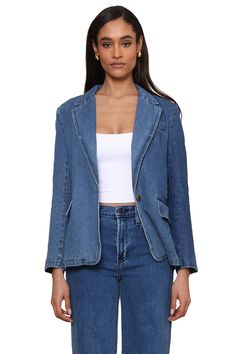 Elevate your style game with this stunning denim blazer - the ultimate wardrobe essential. Upgrade your traditional blazer game with this piece. Featuring two front pockets and a button for a sleek and chic closed look. Its oversized, trendy design is sure to make a statement. Model is 5'10" wearing a size XS, Shell: 100% Cotton, Lining: 100% Polyester, Machine wash cold, Line dry, Notch Lapel Denim Jacket For Workwear, Classic Denim Button-up Blazer, Classic Single Breasted Denim Blazer, Classic Single-breasted Denim Jacket With Notch Lapel, Classic Notch Lapel Single Breasted Denim Jacket, Notch Lapel Denim Blue Outerwear, Classic Medium Wash Blazer With Button Closure, Classic Denim Blazer With Pockets, Denim Blazer With Notch Lapel And Pockets