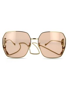 gold-tone metal pink tinted lenses oversize frame signature Interlocking G logo logo plaque at the arm chain-link neck strap straight arms curved tips These glasses come with a protective case. Gold Gucci Glasses, G Logo, Gucci Eyewear, Chanel 2, Neck Chain, Demi Fine Jewelry, Gold Sunglasses, Summer Beach Wear, Fine Earrings