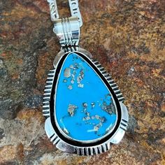 This beautiful Sterling Silver Pendant feature Ithica Peak Kingman Turquoise found in Northwestern Arizona. Created by Navajo jewelers and Navajo silversmiths. Includes 18" Sterling Silver Chain. Black Arrow, Kingman Turquoise, American Jewelry, Native American Jewelry, Sterling Silver Chain, Turquoise Sterling Silver, Sterling Silver Pendant, Sterling Silver Chains, Sterling Silver Pendants