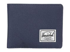 Herschel Supply Co. Roy RFID - Wallet Handbags : Navy/Red : Over-thinking your wallet situation? Don't fret, the simple and functional Herschel Supply Co. Roy RFID wallet has you covered! RFID protection. Classic textile bi-fold wallet. Currency sleeve and multiple credit card slots. Woven logo patch adorns front. Engineered red and white striped tab. Imported. Measurements: Bottom Width: 4 1 2 in Depth: 1 in Height: 3 3 4 in Handle Drop: 4 in Weight: 1.8 oz Casual Bifold Wallets With Coin Pocket, Casual Bifold Wallet With Coin Pocket, Casual Bifold Wallet For Everyday Use, Casual Everyday Trifold Wallet, Casual Bifold Wallet With Card Slots, Casual Wallets With Card Slots, Blue Casual Wallets With Rfid Blocking, Casual Blue Wallets With Rfid Blocking, Casual Blue Rfid Blocking Wallets