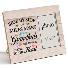 a wooden sign with the words side by side on it and an image of grandmas are always close to the heart