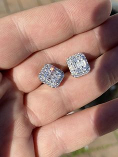 "Amazing mens or womens stud earrings Solid 925 sterling silver! Not Plated Or Filled Wont turn your ears green! 2.5ct simulated diamonds Mix of icy baguette & round stones! SUPER ICY...Must see in the sun! About 0.4\" (10mm) wide perfect large size! Pair weighs around 3.5 grams Screw backs for a secure fit!" Diamond White Earrings With Diamond Accents, Baguette Cut, Formal Sterling Silver Earrings With Baguette Diamonds, Sterling Silver Baguette Diamond Earrings For Formal Occasions, Fine Jewelry Baguette Cut Earrings With Diamond Accents, Formal Sterling Silver Baguette Diamond Earrings, Classic Baguette Diamond Cluster Earrings For Anniversary, Silver Earrings With Baguette Cut In Prong Setting, Silver Baguette Cut Earrings With Prong Setting, Silver Jewelry With Emerald Cut Baguette Diamonds