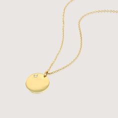 The Chiara necklace is a light gold round disc necklace that you just NEED. Wheather you wear it alone or stacked, with your another necklace or bare alone- it's perfect. Add a personal touch to your Chiara necklace with an engraved portrait of a loved one on one side and their name engraved on the opposite side. If you can dream it- we can make it happen. All features can be customized! Talk to us, we love making custom designs. Our jewelry is carefully handmade in our atelier To order by phone Elegant Charm Necklace With Star Pendant, White Gold Necklace With Round Disc Coin Pendant, Yellow Gold Coin Necklace With Delicate Chain, Elegant Round Pendant Charm Necklace With Star, 14k Gold Necklace With Star Charm And Round Pendant, Everyday Yellow Gold Medallion Necklace, 14k White Gold Round Disc Necklace, White Gold 14k Round Disc Necklace, Dainty Yellow Gold Medallion Necklace