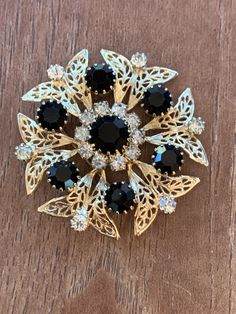 Beautiful Gold Black and White Rhinestone Brooch Pin Signed Celebrity NY #HolidayGift #VictorianBrooch #GiftForHer #JacketPin #BlueFlowers #JewelryBox #StickPin #SterlingSilver #FloralDesign #AntiquePin Black Brooch Jewelry For Wedding, Vintage Black Brooch For Anniversary, Black Rhinestones Brooch For Gift, Vintage Black Brooches For Anniversary, Elegant Black Anniversary Brooch, Antique Pins, Jacket Pins, Vintage Rhinestone Brooch, Mens Gold Jewelry