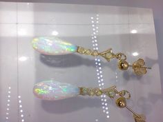 A very attractive pair of 9ct gold and opal drop earrings / ear pendants. As you can see these are absolutely stunning, the main colours shown in the opals are green and pink. Perfect condition Marked for 9ct gold Each earring measures 3.2cm from the stud / gold ball top to the bottom of the opal. Pink Opal Jewelry, Opal Drop Earrings, Earrings Ear, Green And Pink, Pink Opal, Opal Jewelry, Jewelry Earrings Dangle, Dangle Drop Earrings, Opal