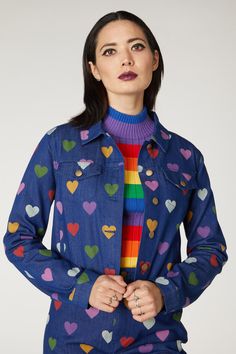 Dive into a playful escapade with the Printed Jacket from Dangerfield, a piece that joyfully marries the classic denim jacket silhouette with a burst of whimsical charm. This regular-fit jacket celebrates the timeless allure of denim jacket style details, complete with a front button closure that adds an air of casual sophistication. Adorned with a vibrant colored hearts print, it effortlessly captures the spirit of adventure and the joy of life's simple pleasures. Crafted from slightly stretchy Playful Cotton Denim Jacket For Fall, Playful Denim Jacket With Pockets For Fall, Playful Long Sleeve Cotton Denim Jacket, Playful Fitted Cotton Outerwear, Playful Blue Outerwear For Fall, Playful Denim Outerwear For Spring, Playful Blue Denim Jacket For Fall, Playful Denim Outerwear For Winter, Fitted Multicolor Long Sleeve Denim Jacket