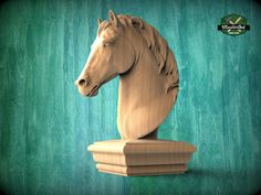 a wooden sculpture of a horse head on a green background with the words munciels written below it