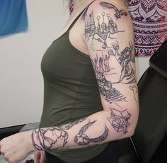 a woman with a tattoo on her arm