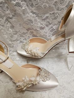 "Bling Wedding shoes closed toes, square heels, ankle straps. Featuring a beautiful crystals flowers, vintage lace appliqués, and vintage asares. I only have materials for 14 pairs. Heel: 2.5\" Colors: White, Off-white, and Ivory. US Sizes: 5, 5.5, 6, 6.5, 7, 7.5, 8, 8.5, 9, 9.5, 10. M width. Outside USA, please goggle a shoe size chart converter, or contact for help! Style: Vintage 20's -40's Great Gatsby, Flapper shoes! Please look at all the pictures TO BUY COLOR SWATCH SAMPLES: to view color Vintage White Heels For Wedding, Vintage Wedding Heels With Pointed Toe, Vintage Heels With Pointed Toe For Wedding, Vintage Pointed Toe Heels For Wedding, Vintage Wedding Heels With Round Toe, Vintage Round Toe Heels For Wedding, Vintage High Heel Wedding Shoes, Vintage Wedding Shoes With Almond Toe, Vintage Closed Toe Wedding Shoes