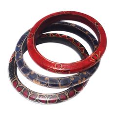 Set of 3 Colorful Floral Batik Wadang Wood Bangle Bracelets - Spring Trinity | NOVICA Traditional Carved Beaded Bracelets For Gift, Traditional Carved Beaded Bracelets As Gift, Bohemian Adjustable Carved Bracelets, Adjustable Bohemian Carved Bracelet, Adjustable Bohemian Carved Bracelets, Traditional Wooden Beads Bracelet For Festival, Traditional Wooden Beads Bracelets For Festival, Artisan Bangle For Festivals And Gifts, Artisan Bangle As Festival Gift