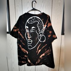 This Upcycled Black Tshirt Has Been Painted And Bleach Dyed By Hand. Comment With Any Questions! Bleached Black T-shirt For Streetwear, Oversized Tie Dye T-shirt With Graphic Print, Oversized Hand Dyed Acid Wash Top, Black Bleached Graphic Tee T-shirt, Hand Dyed Black Crew Neck Top, Black Bleached T-shirt For Streetwear, Black Hand-dyed Relaxed Fit Tops, Black Bleached Relaxed Fit Tops, Black Relaxed Fit Hand Dyed Tops