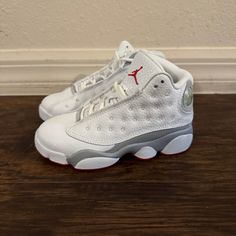 Air Jordan 13 Retro Wolf Grey Kids Shoes Size 11c Dj3005-160 White Basketball Shoes With Rubber Sole, White Jordan Shoes With Branded Insole, White Non-slip Jordan Shoes For Streetwear, White Jordan Shoes For Sports With Round Toe, White Synthetic Jordan Shoes With Boost Midsole, White Synthetic Jordan Shoes With Rubber Sole, White Low-top Basketball Shoes For School, White Synthetic Basketball Shoes With Round Toe, White Mid-top Jordan Shoes With Laces