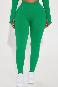 Available In Hot Pink And Kelly Green. High Waist Leggings Elastic Waistband Cross Front Seamless Ribbed Full Length Medium Impact Stretch Pair With "Namaste Seamless Active Top" Imported 92% Nylon 8% Spandex | Namaste Seamless Active Leggings in Kelly Green size XS by Fashion Nova Stretch Ribbed Solid Yoga Pants, Ribbed Stretch Yoga Pants, Green Stretch Ribbed Bottoms, Green Stretch Yoga Pants With Elastic Waistband, Green Stretch Seamless Leggings, Green Bottoms With Elastic Waistband Micro-elastic, Green Bottoms With Elastic Waistband And Micro-elastic Fit, Green Stretch Seamless Yoga Pants, Green Bottoms With Elastic Waistband