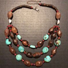 Indulge Your Earthy Side With This Beautiful Three-Strand Turquoise And Wood Bead Necklace. Sterling Silver Lobster Clasp. New And Never Worn. Great Condition! 3 Strand Beaded Necklace, Brown Beaded Turquoise Necklace With Round Beads, Artisan Brown Turquoise Necklace For Jewelry Making, Artisan Brown Turquoise Necklace With Gemstone Beads, Artisan Beaded Brown Turquoise Necklace, Artisan Brown Beaded Turquoise Necklace, Bohemian Brown Turquoise Necklace With Gemstone Beads, Gift Turquoise Necklace With Polished Brown Beads, Gift Brown Turquoise Necklace With Polished Beads