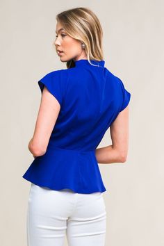 A solid woven top featuring high neckline, pleating detail at shoulder, peplum and back zipper closure 95% Polyester; 5% Spandex Chic Peplum Blouse For Work, Chic Peplum Workwear Blouse, Chic Peplum Tops For Formal Occasions, Chic Formal Peplum Tops, Chic Stretch Top For Office Wear, Elegant High Neck Top With Ruffles, Elegant High Neck Ruffle Top, Ruffled Peplum Top For Workwear, Ruffled Peplum Tops For Work