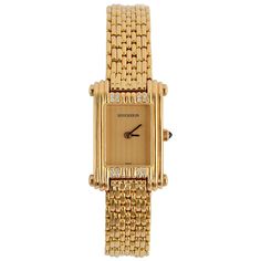 This versatile Boucheron 18 gold watch can be dressed up or down. It comes with a gold band or can be interchanged with either one of red leather or tan ostrich. The watch itself measures 11/16" x 1 1/8" to the edges. It has two diamonds both above and below the face. The stem is sapphire. The gold band measures half an inch wide. The watch with gold band has a wearable length of 6 3/4 inches. It is battery operated. Luxury Vintage Yellow Gold Watch Bands, Luxury Yellow Watch Accessories, Luxury Gold Watch With Timeless Design, Luxury Modern Gold Jewelry And Watches, Luxury Modern Jewelry And Watches For Women, Luxury Yellow Gold Metal Watch, Ray Rectangle Gold Plated Cocktail Watch, Bucherer Diamond Watches, Luxury Yellow Gold Polished Watch Accessories