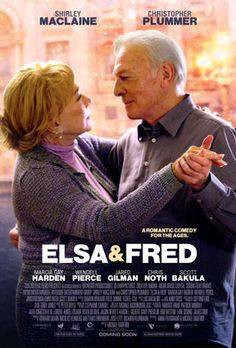 an older man and woman dancing together in front of a movie poster for the film elsa & fried