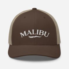 We grew up surfing Malibu. Our Malibu Wave Embroidered Trucker Hat is super-soft and so comfortable. Perfect for a morning walk or run or a day in the sun. Or just for hanging out. Malibu style. Six-panel cap with a mesh back. We ship our hats in boxes so they won't get crushed in shipping. Beach Trucker Hat With Embroidered Logo And Curved Brim, Trucker Hat With Embroidered Logo For Beach, Casual Outdoor Trucker Hat With Embroidered Logo, Casual Trucker Hat With Embroidered Logo For Outdoor, Casual Trucker Hat With Letter Print For Outdoors, Casual Brown Trucker Hat For Sports, Malibu Style, Morning Walk, Navy White