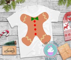 a t - shirt with an image of a gingerbread man on it, surrounded by other christmas items