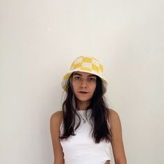 ✮ This checkered bucket hat was designed with the desire to create a funny, young and free street style. ✮ Goes with any outfit and looks great whatever the season. ✮ Like my other products, this checkered bucket hat is also carefully knitted. ✮ Crochet cream and yellow checkered bucket hat is completely handmade and is 100% cotton.  ✮ Excellent gift checkered bucket hat for men and women. ✮✮ If you want to mix different colors and design a special hat for yourself, you can choose a color from the color scale and let me know. --- Details --- ✮ 100% cotton. ✮ Sun protection, packable. 💐 Care instructions 💐 ✮ Hand washable. ✮ You can iron it with a steam iron.   Note💌 Not sure what hat size you are? No problem it's easy: Just take a measuring tape measure just above your ears around your Trendy White Winter Bucket Hat, Trendy Yellow Wide Brim Bucket Hat, Casual Yellow Cotton Bucket Hat, Trendy White Brimmed Bucket Hat, Trendy Yellow Bucket Hat For Summer, Trendy Yellow Bucket Hat For Beach, Trendy White Bucket Hat, Trendy Yellow Beach Bucket Hat, Trendy Yellow Sun Hat With Curved Brim