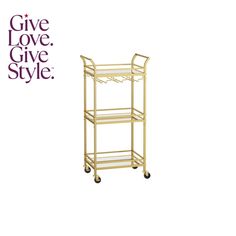 a gold serving cart with two trays on it and the words give love, give style