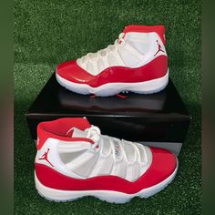 The Air Jordan 11 Cherry Brings A Chicago Colorway To The Iconic Patent Leather Sneaker. Cherry Red Patent Leather Mudguards Surround The Majority Of The Upper, Alongside - Brand New - Mens Size 11 - Womens Size - Got Directly From Snkrs As Shown In Pictures Classic Red Basketball Shoes With Round Toe, Red Synthetic Basketball Shoes With Air Cushioning, Red High-top Basketball Shoes With Air Cushioning, Custom Red Leather Sneakers With Air Cushioning, Classic Red High-top Jordan Shoes, Red Leather Basketball Shoes With Air Cushioning, Red Jordan Shoes With Air Cushioning And Round Toe, Red High-top Jordan Shoes With Air Cushioning, Classic Red High-top Sneakers With Round Toe