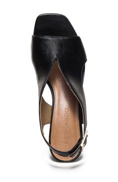 Curvy cutouts and a deep vamp distinguish this leather slingback pump set on a cushioned footbed and lofty block heel. 2" heel Cushioned footbed Leather upper, lining and sole Made in Brazil Leather Slingback Pumps With 4-inch Heel, Black Leather Slingback Pumps With Deep Heel Cup, Sleek Leather Slingback Pumps With Open Toe, Leather Slingback Sandals With Deep Heel Cup For Work, Leather Slingback Block Heels For Evening, Modern Leather Slingback Pumps With 4-inch Heel, Leather Slingback Block Heels With 4-inch Heel, Leather Wedge Block Heels Medium Width, Evening Open Toe Slingback Pumps With Stacked Heel