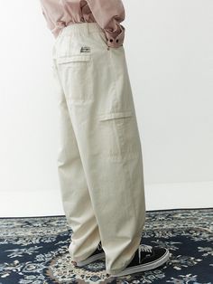 This is a casual and comfortable balloon pants that is made out of sturdy cotton 100% fabric. With soft touch of the fabric, elastic waistband, and hidden pocket, it can be easily styled for your daily outfit.- Washed cotton twill fabric for soft touch- Elastic waistband- Hidden pocket detail Casual Relaxed Fit Cargo Pants With Hip Pockets, Cotton Pants For Streetwear, Cotton Pants With Pockets For Streetwear, Streetwear Cotton Pants With Pockets, Casual Relaxed Fit Pants With Patch Pockets, Cotton Wide Leg Pants With Pockets And Relaxed Fit, Relaxed Fit Cotton Wide Leg Pants With Pockets, Relaxed Fit Wide Leg Cotton Pants, Cotton Wide-leg Parachute Pants With Cargo Pockets