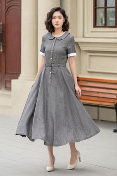 Elegant grey linen dress with a flowing midi design, perfect for a stylish and trendy look. This dress is a must-have for women's fashion, combining comfort and sophistication effortlessly. ✨ 

SKU 4940 

#Fashionista #LinenLove #ChicStyle #WomensWear #LinenDress #Xiaolizi #Xiaolizihandmade Chic Gray A-line Dresses, Elegant Gray Summer Dresses, Classic Linen Dress For Spring Daywear, Gray Midi-length Summer Dresses, Gray Knee-length Midi Dress For Summer, Classic Summer Midi Dress For Semi-formal Occasions, Gray Knee-length Summer Midi Dress, Classic Semi-formal Summer Midi Dress, Fitted Collared Linen Dress, Elegant Style