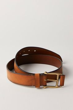 Essential to any collection of accessories, this belt is featured in a soft leather fabrication and classic silhouette with an elevated metal buckle. **Features:** Soft leather fabrication, elevated metal buckle, adjustable fit, medium width **Why We ❤ It:** This leather belt pairs perfectly with all your favorite denim. | Carraway Leather Belt by Free People in Brown, Size: M/L Leather Belt With Buckle For Workwear, Leather Belt With Buckle Closure For Work, Leather Belt Buckles With Brass Buckle For Work, Formal Leather Belt With Brass Buckle, Formal Bridle Leather Belt With Brass Buckle, Brown Belt With Brass Buckle For Work, Brown Workwear Belt With Brass Buckle, Modern Leather Belt With Brass Buckle, Business Belt With Brass Buckle In Bridle Leather