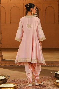 Blush pink short anarkali, adorned with kashmiri tilla, parsi gara embroidery and highlighted with basra moti. Paired with a dogri salwar and embroidered border dupatta. - Aza Fashions Parsi Gara Embroidery, Short Anarkali, Gara Embroidery, Pink Anarkali, Embroidered Border, Embroidered Shorts, Pink Shorts, Three Quarter Sleeves, Anarkali