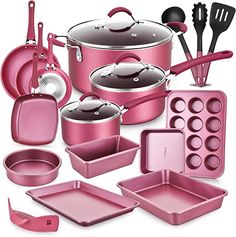 an assortment of pink kitchenware including pots, pans and utensils