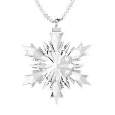 a snowflake necklace on a white background