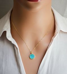 Add some bright color to your look this necklace! Featuring a polished Turquoise slice on your choice of a sterling silver or 14k gold filled chain, this gemstone is believed to bring balance and serenity to its wearer. Turquoise is also the birthstone for December!Stone Size: average 12mm (.47") Modeled Size: 16 Inches Blue Coin Pendant Jewelry As Gift, Blue Coin Pendant Jewelry For Gifts, Turquoise Necklace With Coin Pendant As A Gift, Turquoise Coin Pendant Jewelry As Gift, December Stone, January February March, Genuine Turquoise, December Birthstone, Turquoise Pendant