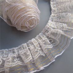 PRICES MAY VARY. Color: White and Gold; Material: Voile, Organza, Gold line; Width: 5cm(1.96") Length: 3 Yards（will be sent in one continuous piece） Very beautiful vintage gold 2-layer organza pleated ruffle lace. Perfect for decorating, floral designing, making hair accessory and DIY headbands, bouquets and other crafts, Ideal for clothing, costume, dress, curtain DIY sewing. Ideal for wedding decorations, decorating gift baskets, accenting home textiles. Curtain Diy, Diy Headbands, Clothes Decoration, Wedding Bridal Dress, Voile Fabric, Making Hair, Party Clothes, Diy Headband, Craft Wedding