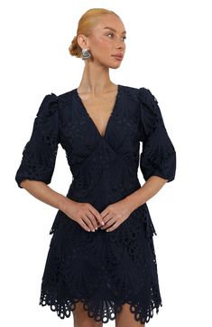 Gorgeous scalloped fans with dainty eyelets overlay an Empire-waist minidress that's ready for your next get-together. 35" length (size Medium) Hidden back-zip closure Deep V-neck Elbow-length sleeves with elastic cuffs Lined 100% polyester Hand wash, line dry Imported Fitted V-neck Eyelet Dress, Evening Fitted Lace Dress With Scalloped Edges, Fitted Lace Dress With Scalloped Edges For Evening, Fitted V-neck Mini Dress With Scalloped Lace, Party Dresses With Scalloped Edges, Mini Length, Party Dress With Scalloped Edges In Mini Length, Fitted Lace Mini Dress With Scalloped Edges, Party Dress With Scalloped Edges Mini Length, Spring Lace Dress With Back Zipper