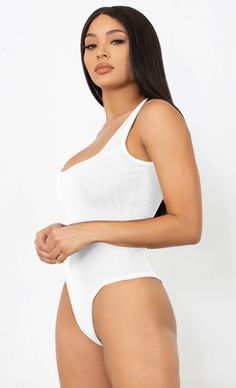 High Cut Seamless Bodysuit For Summer, Fitted Ribbed Tank Bodysuit, Trendy Scoop Neck Short Sleeve Bodysuit For Summer, Spring Sleeveless Ribbed Bodysuit, Solid Spring Bodysuit With Seamless Construction, Trendy Summer Scoop Neck Short Sleeve Bodysuit, Trendy Ribbed Sleeveless Bodysuit, Trendy Tank Bodysuit Seamless, Trendy Short Sleeve Bodysuit With Scoop Neck For Summer