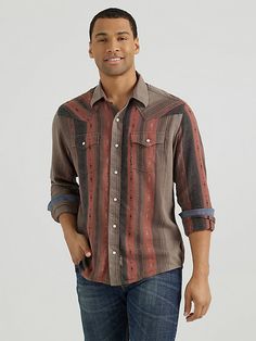 SERIOUS ON STYLE AND COMFORT Look good while feeling good in the men's Wrangler Retro® long-sleeve western snap printed shirt. This contemporary take on the classic style you love comes packed with all the distinctive details, including pointed front and back yokes, single-needle stitching at the placket, modern fit, contrast trim, two snap cuffs, and two chest flap pockets with snaps. This long-sleeve snap shirt features a modern fit and it's crafted from cotton for comfort, minimal wrinkling, Western Boots For Men, Retro Jeans, Wrangler Shirts, Work Boots Men, Jumpsuit Jacket, Retro Stripes, Feeling Good, Western Shirts, Contrast Trim