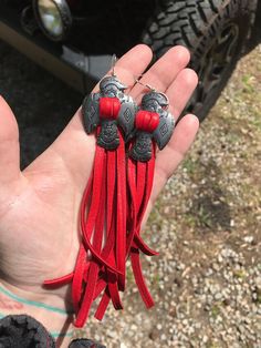 Extra long, handmade tassel earrings with thunderbird conchos These are made from luxuriously buttery soft red leather and finished with sterling silver plated, nickel free ear wires  These are head turners! Thanks for shopping @boholeathercraft Made to order so variations will occur but your pair will be very similar to the photos Western Style Red Jewelry As Gift, Adjustable Concho Earrings For Festival, Southwestern Fringe Earrings For Festivals, Southwestern Tassel Earrings For Festivals, Adjustable Red Tasseled Jewelry, Adjustable Red Jewelry With Tassels, Adjustable Red Leather Earrings, Southwestern Fringe Dangle Jewelry, Red Tassel Earrings For Festivals