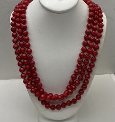 "Beautiful Vintage Genuine Deep Red Coral 7mm. Triple Strand Necklace with Mother of Pearl Flower carved silver plated clasp good pre/owned condition measures 18\" to 20\" layers and wearable 119 grams." Formal Single Strand Red Coral Necklace, Elegant Red Coral Jewelry With 8mm Beads, Formal Single Strand Red Coral Jewelry, Elegant Red Coral Necklace For Formal Occasions, Elegant Red Coral Necklace For Formal Events, Classic Red Coral Formal Jewelry, Formal Red Single Strand Necklace, Classic Red Gemstone Beads Necklace, Classic Red Necklace With Gemstone Beads