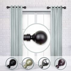 the curtain is open and there are four balls in front of it, with one ball on