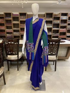 A Marvellous Embroidered Kashmiri Saree, which you can wear at any party or a wedding.- - - - - - - - - - - - - - - - - - - - Product Details- Condition: Brand New- Style: Saree- Embroidery: Kashmiri Tilla Embroidery- Base Colour: Royal Blue- Embroidery Colour: Golden - Care Instructions: Dry Clean OnlyF A B R I CSaree: Pure CrepeBlouse: Pure CrepeF I N I S H- UnstitchedYou can get it stitched locally.- StitchedWant your blouse ready to wear, let us know the style you want and we will stitch it Festive Handloom Traditional Drape Dress, Multicolor Embroidered Raw Silk Saree Dress, Traditional Chanderi Handloom Dress, Raw Silk Saree Dress With Multicolor Embroidery, Semi-stitched Royal Blue Blouse Piece For Wedding, Multicolor Embroidered Raw Silk Dress With Traditional Drape, Raw Silk Dress With Multicolor Embroidery In Traditional Drape, Traditional Drape Dress In Raw Silk With Multicolor Embroidery, Traditional Drape Dresses In Multicolor Embroidered Raw Silk