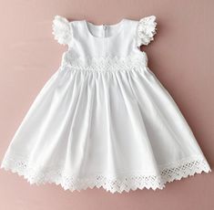 White cotton dress for baby girl. It can be used for baptism, christening, wedding, birthday. The fabric is natural cotton. The ruffles sleeved are made of natural lace. We can sew matching booties. bloomers and headband with the same lace as on the dress. The price is only for the dress. *Link for matching headband: https://www.etsy.com/listing/1448376512/baby-headband-baby-headband-bows-baby?click_key=1ff5a799e855b91c093ed4ff74e45fd71011c47c%3A1448376512&click_sum=0b71eb2c&ref=shop_home_active_1&sts=1 *shoes: https://www.etsy.com/listing/1462586117/baby-baptism-shoes-white-baby-booties?click_key=508860ad1e9a25f8a20eab09bf847aa261bdb695%3A1462586117&click_sum=3f65e01c&ref=shop_home_active_1&sts=1 *bloomers: https://www.etsy.com/listing/1448369992/white-baby-bloomers-baptism-girl-outfit?cl Girl Baptism Dress, White Baptism Dress, Headband Bows, Baptism Dress Baby Girl, Dress For Baby Girl, Girl Baptism, Baby Baptism, Baby Bow Headband