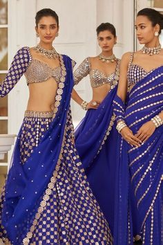 Blue flared attached cancan lehenga with mirror hand embroidery in floral pattern. Paired with a padded mirror embroidered blouse and dupatta with mirror embroidered border. - Aza Fashions Designer Blue Pre-draped Saree With Gota Work, Blue Pre-draped Saree With Gota Work For Reception, Blue Pre-draped Saree For Navratri With Motifs, Wedding Choli In Georgette With Motifs, Wedding Lehenga With Motifs In Georgette, Party Choli With Motifs For Eid, Designer Blue Lehenga With Motifs, Blue Choli With Mirror Work For Festivals, Georgette Choli With Motifs For Reception