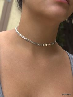 "\" THE DISCO CHOKER \" Trendy and fashionable! Super popular disc choker necklace is a must have. This gorgeous silver disc choker will compliment your outfit and its perfect for layering! You can even wrap it around twice to be a bracelet L E T S . T A L K . C H O K E R S ✤ Available in 14k Gold Filled or Sterling Silver ✤ Size - 12\" ✤ OPTIONAL * Please choose from drop down box - 1\" or none - Extension from clasp for an adjustable length. All purchased items will arrive in a Tommassini Jewe Dainty Silver Choker With Adjustable Chain, Dainty Silver Choker With Delicate Chain, Silver Minimalist Choker With Adjustable Chain, Minimalist Silver Choker With Adjustable Chain, Minimalist Silver Choker With Clavicle Chain, Nickel-free Sterling Silver Choker, Trendy Adjustable Silver Choker, Sterling Silver Choker With Silver Chain, Nickel Free Round Silver Choker