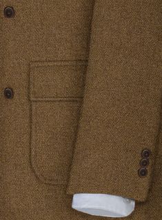 Perk up your ordinary formal wear with our tweed overcoat. Crafted from wool, the tweed outfit will be the perfect staple in your wardrobe that will take you from season to season in style.  
 
 Look Includes  Musto Royal Brown Heavy Tweed Fabric  Horn Brown Buttons  Peak Lapel (5 inch)  Single Vent   Three  Cuff Button   You can change the look during customization if required. 
 
 Lining: 100% Viscose; Dry Clean. Formal Tweed Blazer With Double Button Closure, Business Long Coat Single Breasted Tweed Jacket, Business Long Coat Style Single Breasted Tweed Jacket, Classic Tweed Jacket With Lapel Collar And Double Button, Tweed Sport Coat With Welt Pockets For Work, Winter Business Casual Tweed Jacket With Lapel Collar, Formal Tweed Outerwear With Double Button Closure, Fall Tweed Jacket With Notch Lapel And Buttons, Tailored Long Tweed Jacket For Work