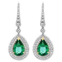 Drop Earrings with Pear Shape Emeralds and diamonds Mounted in 18K White & Yellow Gold with 3 row pave halo around Emeralds and Diamond gallery on the back Each stone is 3.48ct Natural Green Emerald Pear Shape , originated in Africa Total carat weight of diamonds: 2.05ct Retail Value: 50,000$ Comes with box, appraisal available upon request Emerald Earrings Drop, Gold For Sale, Jewelry Auction, Fabulous Jewelry, Diamond Drop Earrings, Tennis Bracelet Diamond, Green Emerald, Diamond Pendant Necklace, Dream Jewelry