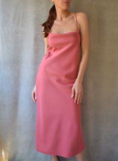 "Slip midi dress with adjustable criss cross back straps featuring a cowl neck in pink berry color. Mid calf length. Lightweight non-stretchy fabric. Model is (172 cm - 5'8\") and (53 kg - 117 lbs) and is wearing size S Handmade in Bali Composition: 100% Viscose" Solid Color Midi Dress With Spaghetti Straps For Brunch, Elegant Pink Midi Dress With Adjustable Straps, Sleek Solid Midi Slip Dress, Pink Midi-length Bias Cut Slip Dress, Cross Back Dress, Slip Midi Dress, Pink Berry, Berry Color, Back Dress