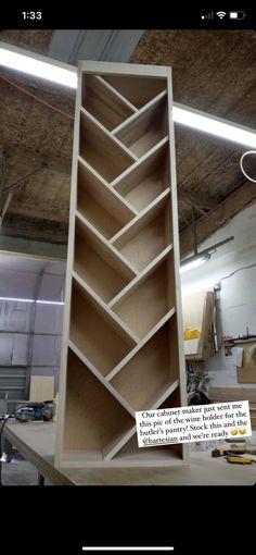 a large wooden shelf sitting inside of a building